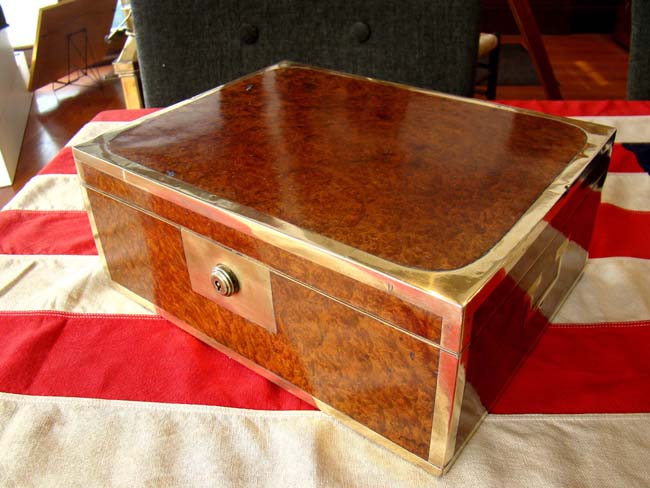An English 'campaign' style burled walnut gentleman's travelling box circa 1820